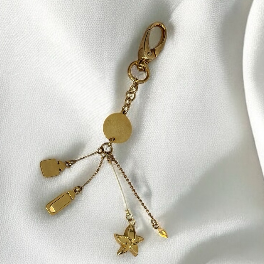 Luxurious genuine Vintage Lalique Parfums gold tone keychain purse chain gift
